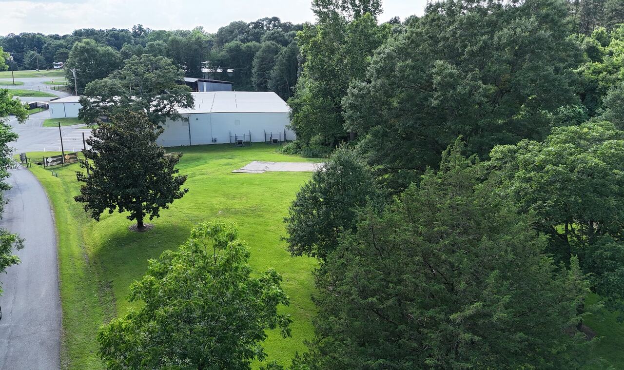 Bird's-eye view showing the scale and surrounding context of a commercial campus