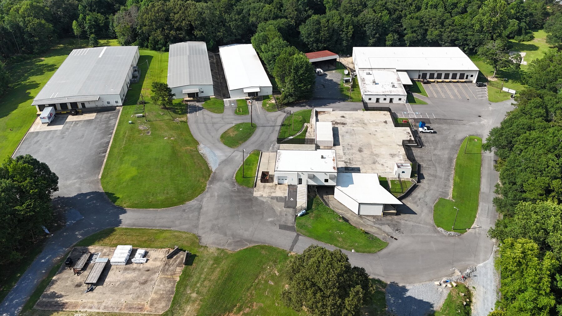 Aerial view of a multi-building commercial and industrial campus on Interchange Drive.