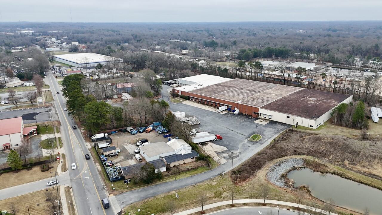 Aerial documentation of an industrial property and surrounding site conditions